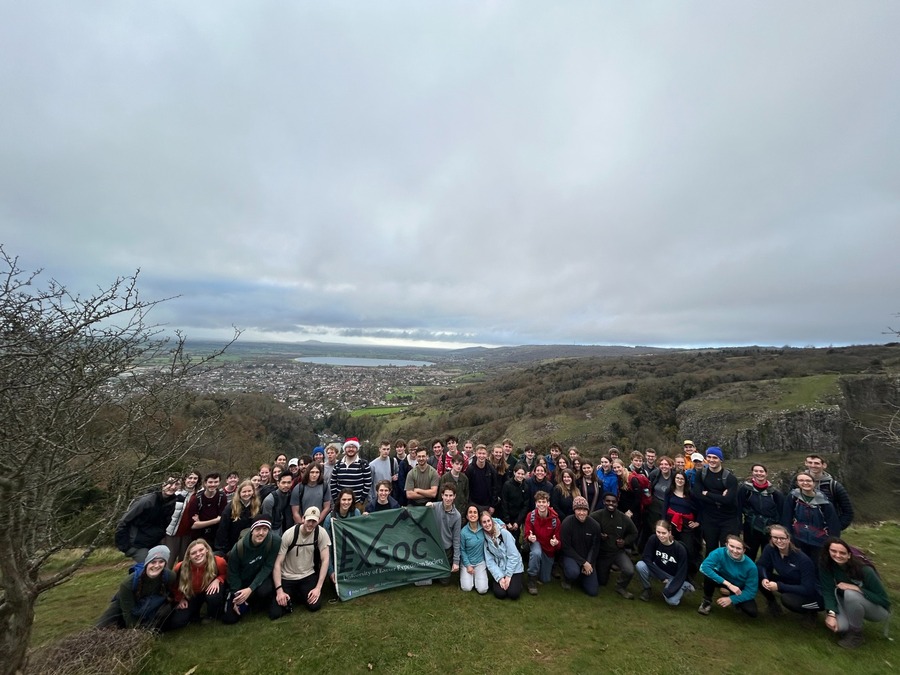 The exsoc christmas trip group photo in front of cheddar gorge
